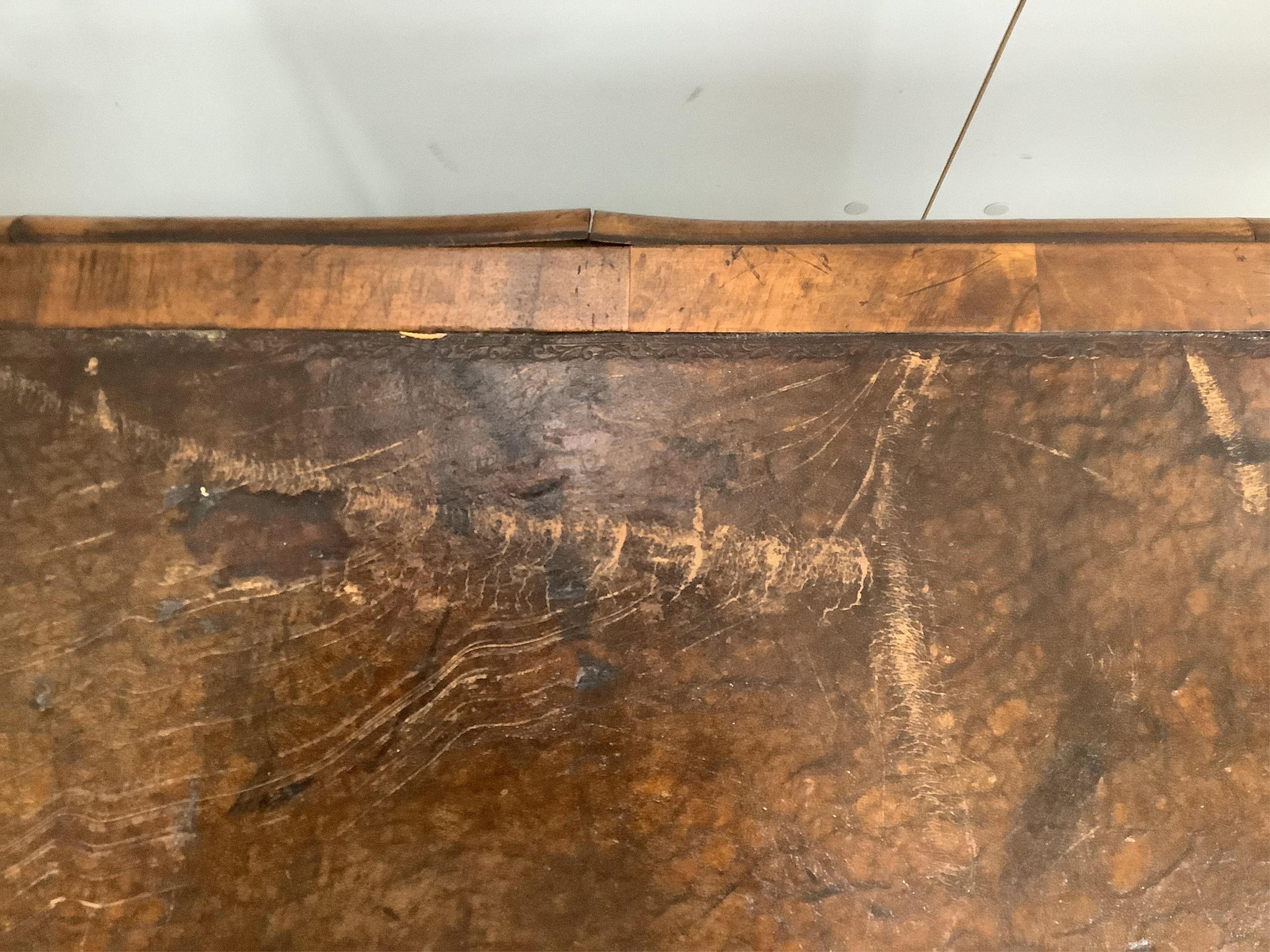 A 1930's walnut kneehole walnut writing table, width 148cm, depth 68cm, height 76cm. Condition - fair to good